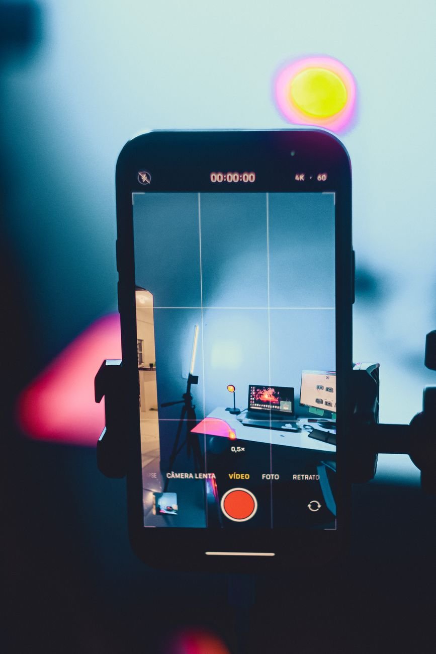 Smartphone recording a vibrant colorful content creation studio setup